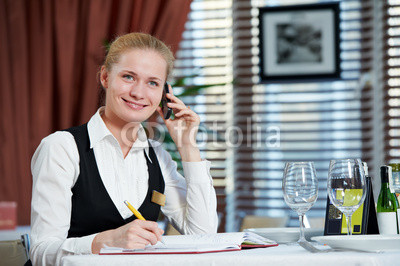 restaurant_manager_woman_at_work_place.jpg